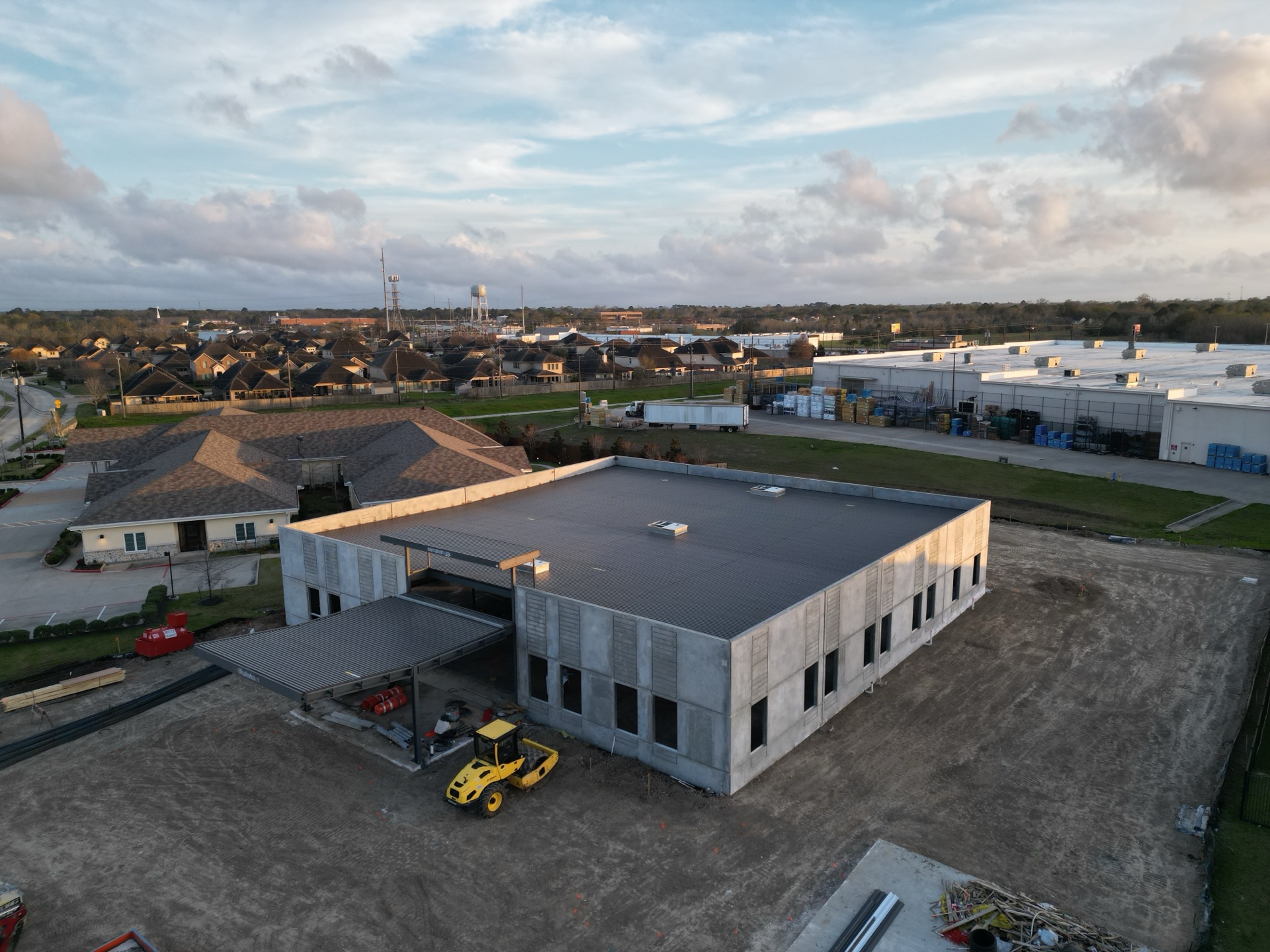 Aerial still of the CLS Clinic site, March 2026 — view 3 of 4