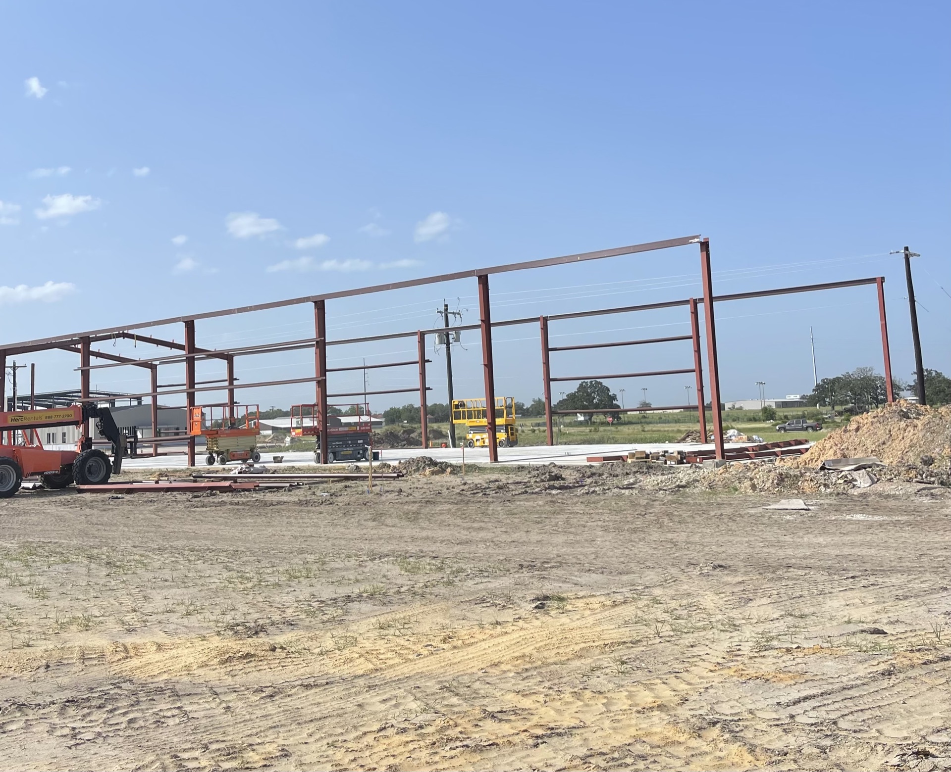 Aerial still of the Coutler Buildings (1&2) site, July 2026 — view 2 of 2